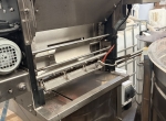 Machine à désoperculer 